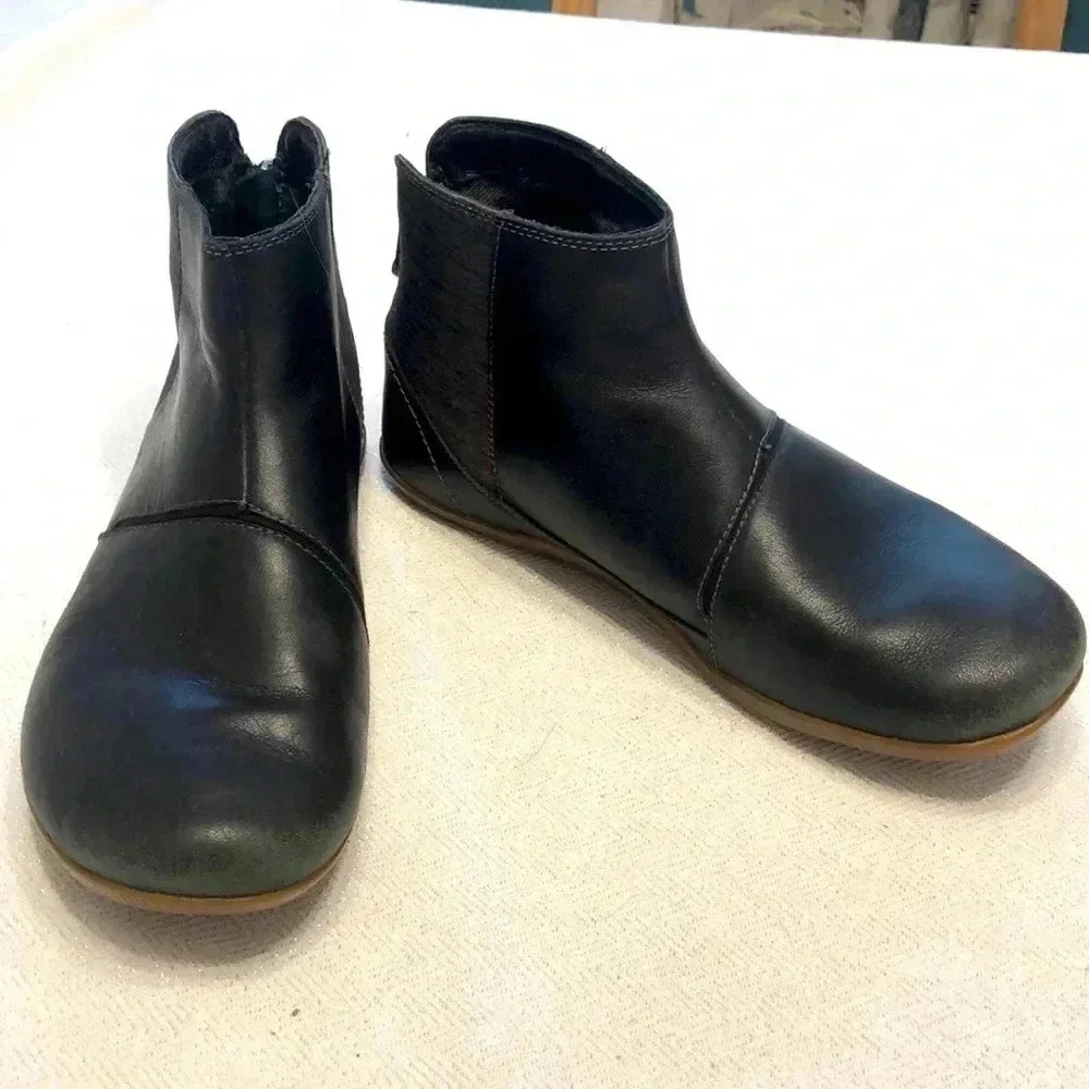 Ahnu Leela ankle boots.  Black leather and fabric upper w/ rubber sole. Size 8.5